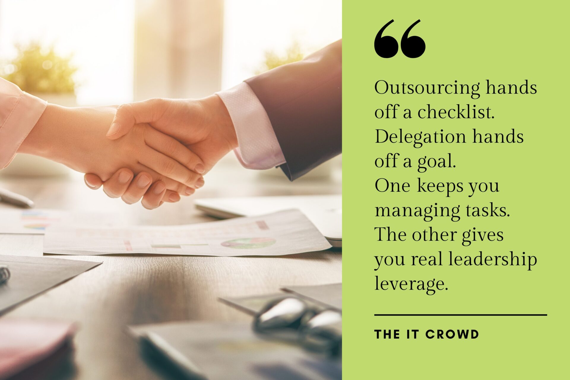 Close-up of two professionals shaking hands across a desk scattered with charts and documents in a sunlit office.