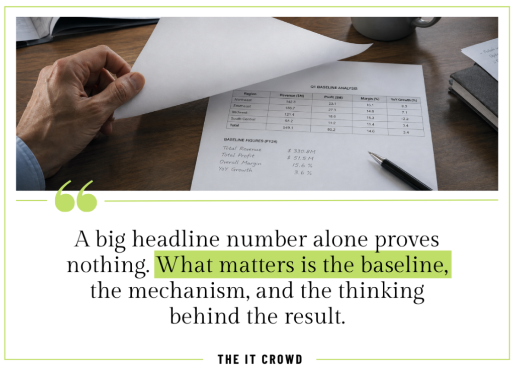 A hand turning past a report's headline page to reveal a Q1 baseline analysis table with regional revenue figures.
